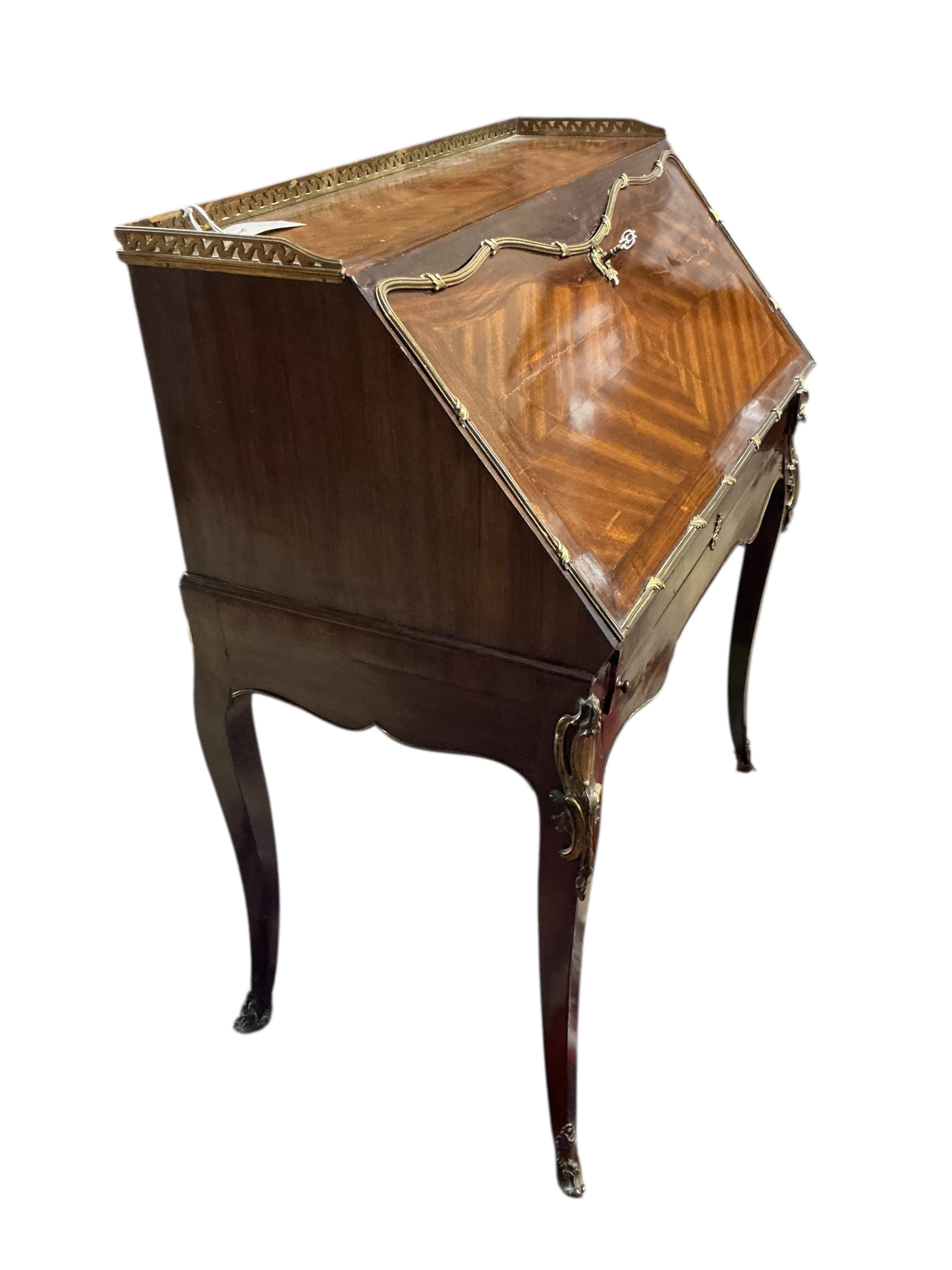 A Louis XVI style gilt metal mounted kingwood bureau de dame, width 84cm, depth 45cm, height 103cm